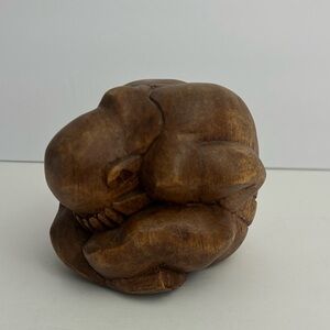 Carved wooden crying man munk weeping sculpture